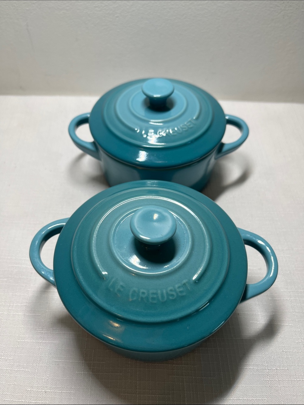 Pair of Le Creuset Caribbean Blue Mini Stoneware Cocottes with Lids
New
Set of 2